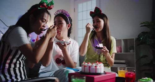 Three Young Women Celebrating Birthday Party at Home