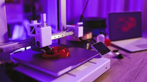 3D Printer Creating Red Object