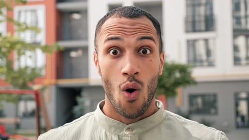 Man's Surprised Reaction on Face, Close Up Shot