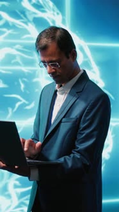 Vertical Video Computer Scientist Using Laptop to Implement Artificial Intelligence