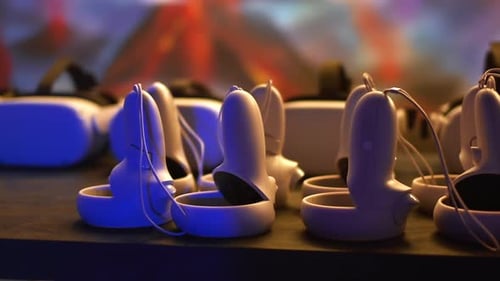 Virtual Reality Headsets and Controllers on Table