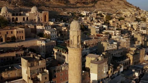 Mardin Grand Mosque Minaret And The Old Cityscape At Sunset In Southeastern Turkey. Aerial, Close up
