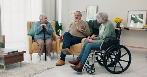 Seniors Chatting in Bright Living Room