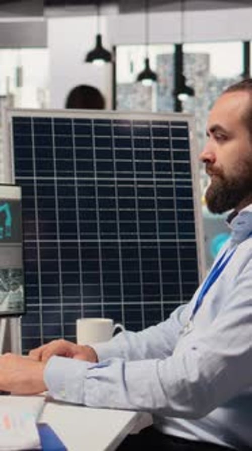 Portrait of Happy Sustainable Energy Researcher Using Simulation Software