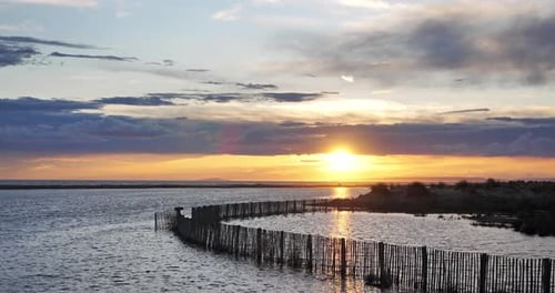 Sunset over the the Espiguette beach, the Camargue, Southern France