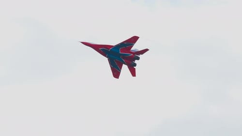 Fighter Jet Flying in a Cloudy Sky