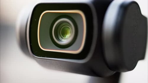 Close up of a small video camera with an image stabilizer