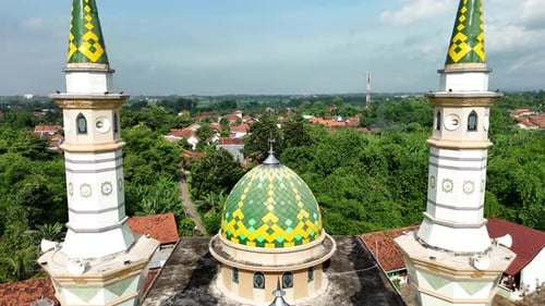 Drone view of Islamic Mosque with tower and town view