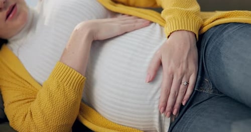 Pregnant Adult Resting Peacefully at Home