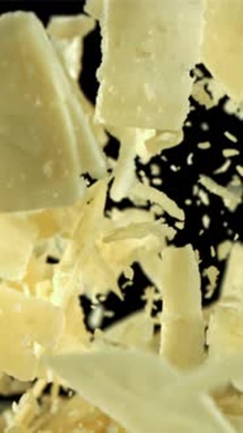 Parmesan Cheese Flies Up and Falls Down Filmed on a Highspeed Camera at 1000 Fps