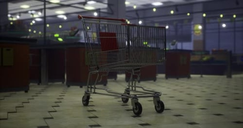 Shopping Cart in an Empty Supermarket During Late Evening Hours