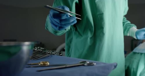 Surgeons Performing Critical Procedure in Operating Room