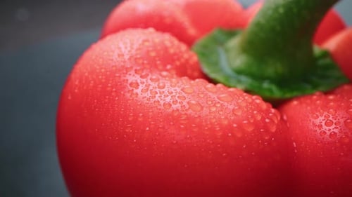 Extreme Close-Up of Fresh Red Bell Pepper with Water Droplets – 4K Footage