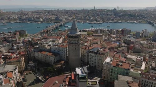 Orbit Shot Around Old Galata Tower Popular Tourist Landmark in Historic Urban Borough City with