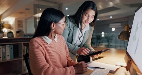Business women, tablet and teamwork on computer for graphic design planning