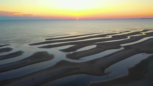 Cape Cod Bay Colorful Sun Set Aerial Drone Footage of Beach at Low Tide with People Walking, Sand Ba