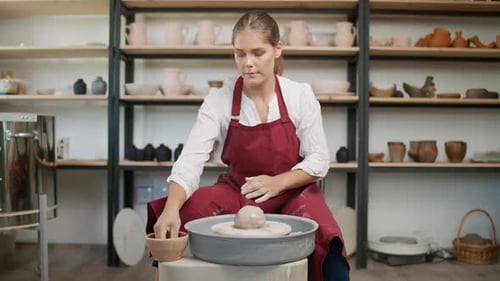 Pottery Workshop Woman Ceramist Makes a Pitcher Out of Clay Handicraft Production of Handmade
