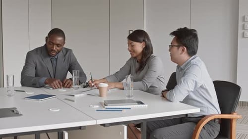 Business Colleagues Meeting in Modern Conference Room