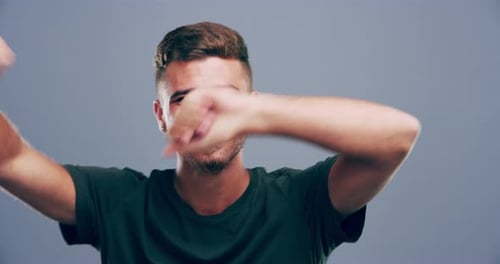 Man Celebrating and Dancing with Joyful Expression