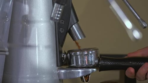 Coffee Grinder Filling Portafilter with Fresh Grounds