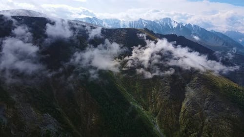 Drone Video of Alpine Valley Green Mountains and Misty Valley
