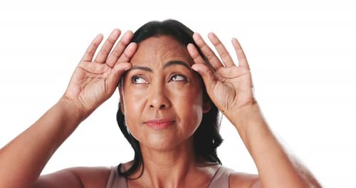 Skincare, thinking and mature woman in studio with anti aging, natural and beauty for wrinkles