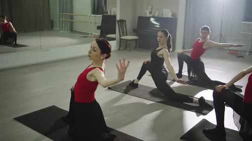 Group Stretching Class Using Ballet Techniques