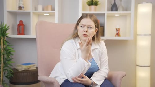 Suspicious young woman thinks.