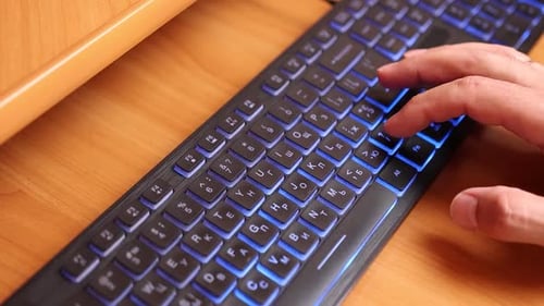 20Hands working on laptop with keyboard and mouse on wooden desk, concept of technology, internet, d