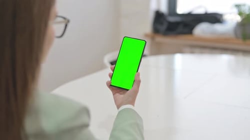 Business Woman Using Phone with Green Screen