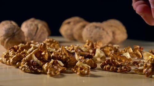 Walnuts On Wooden Plate