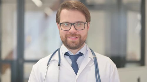 Portrait of Smiling Doctor in Clinic