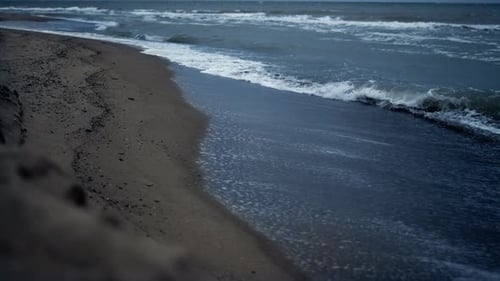 Stormy Beach Waves Crashing on Shore