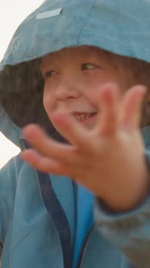 Kid Spirit Uplifted By Refreshing Rain
