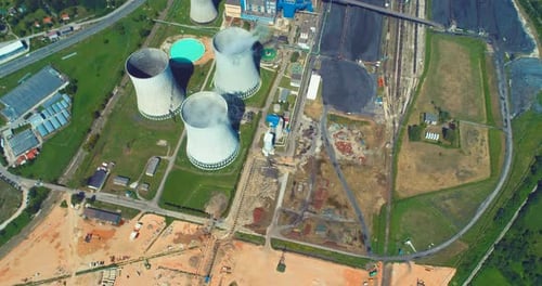 Aerial View of Coal Power Plant High Pipes with Black Smoke Moving Up Polluting Atmosphere at Sunny