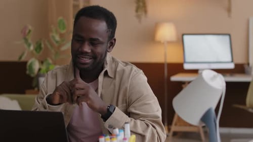 Man Having Video Call on Laptop Computer