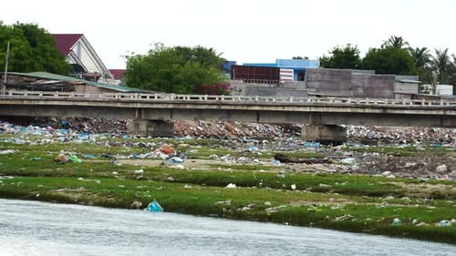 Trash Strewn Across Landscape At Son Hai In Vietnam. Locked Off