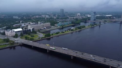 Aerial drone video of the Vistula River in Riga on a grey, moody day