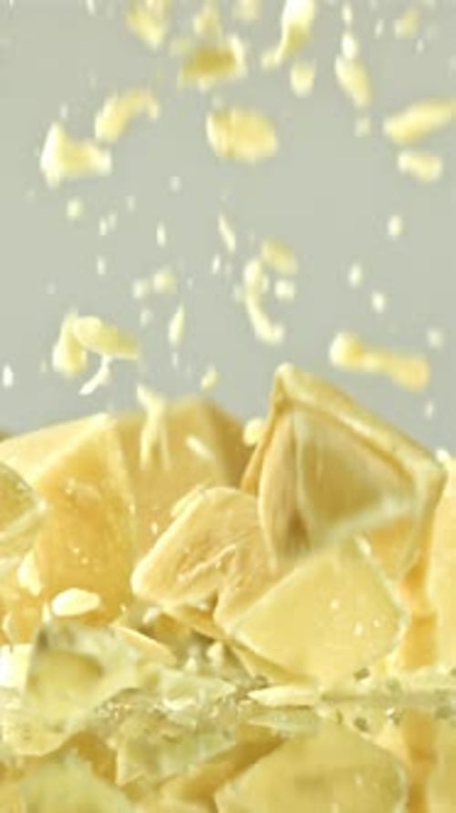 Super Slow Motion Pieces of White Chocolate Filmed on a Highspeed Camera at 1000 Fps