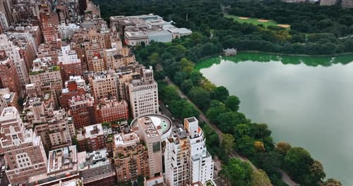 Densely built neighborhood near the Central Park in New York. Urban landscape contrasting