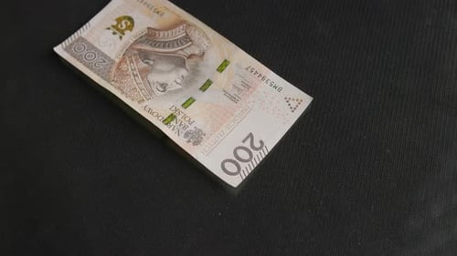 Money exchange, Inflation, pay reduction, Polish FIAT currency. 100 zł 200 zł PLN