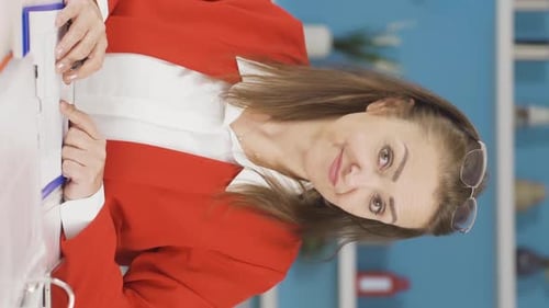 Vertical video of Ambitious and determined portrait of home office worker woman.