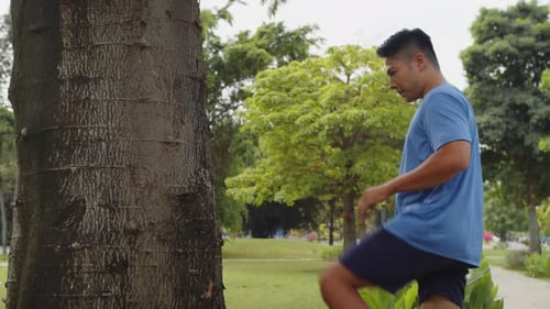 Sportsman Training for Marathon in City Park