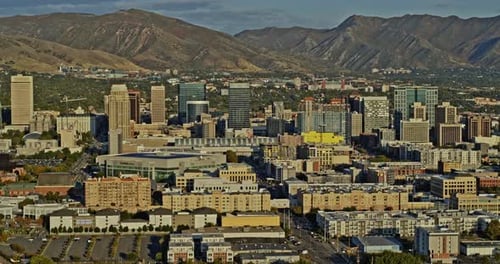 Salt Lake City Utah Aerial v27 elevation drone fly up shot capturing downtown cityscape with beautif