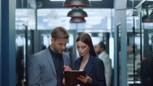 Business Colleagues Discussing Plans in Office