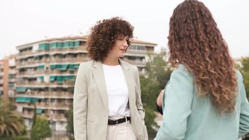 Business People Handshake on City Rooftop