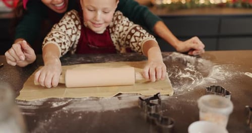 Girl and Woman Baking Holiday Cookies at Home
