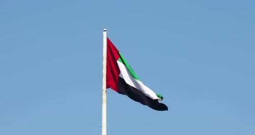 Flag Of United Arab Emirates On A Flagpole, Waving