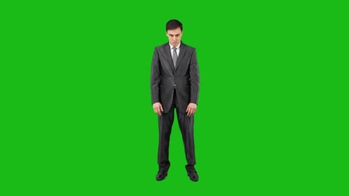 Shocked Businessman in Suit in Studio