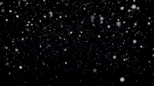 Large Snow Crystals Descending Diagonally from Left to Right 4K Loop